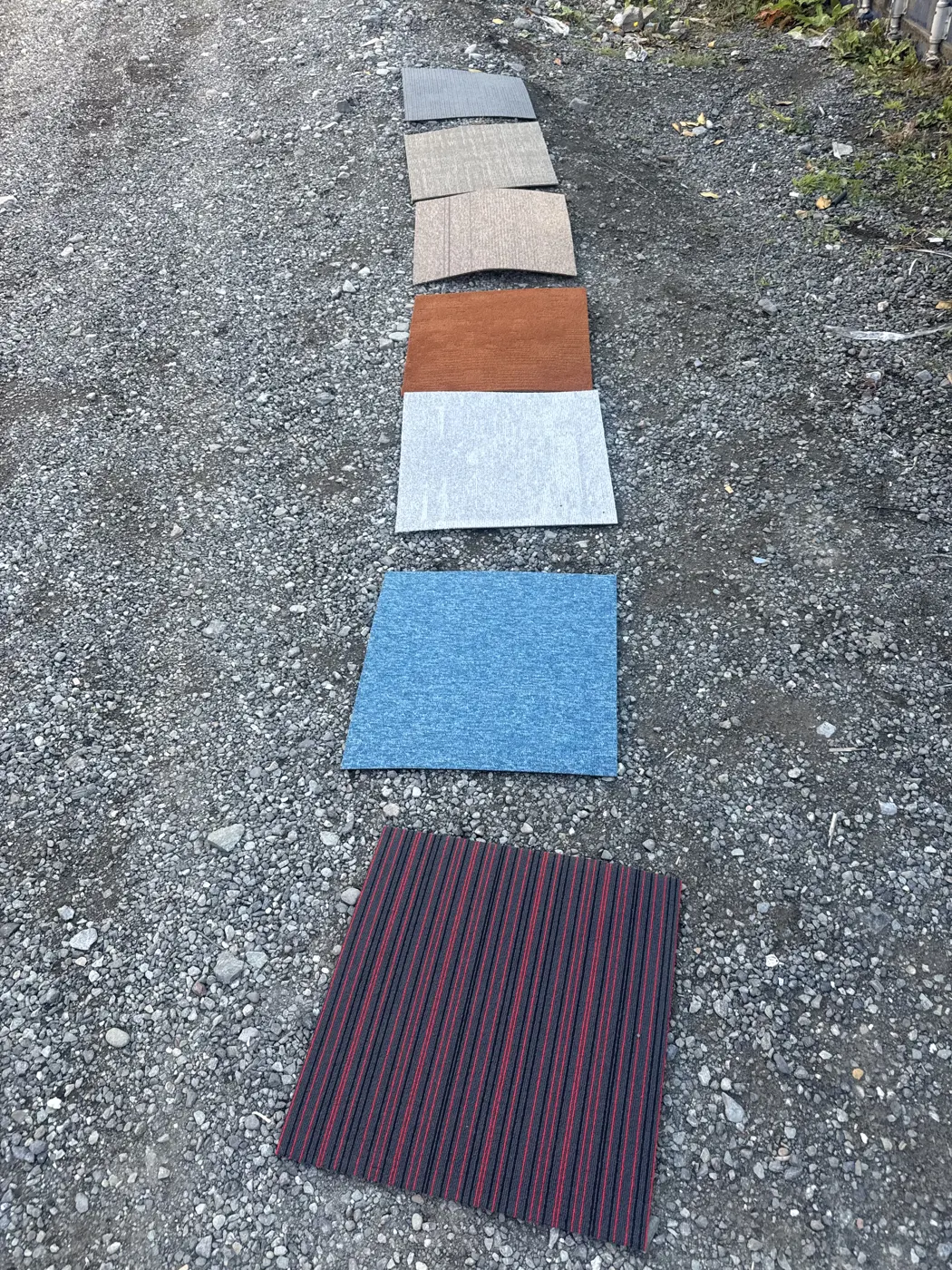 Close-up of light grey textured carpet tile